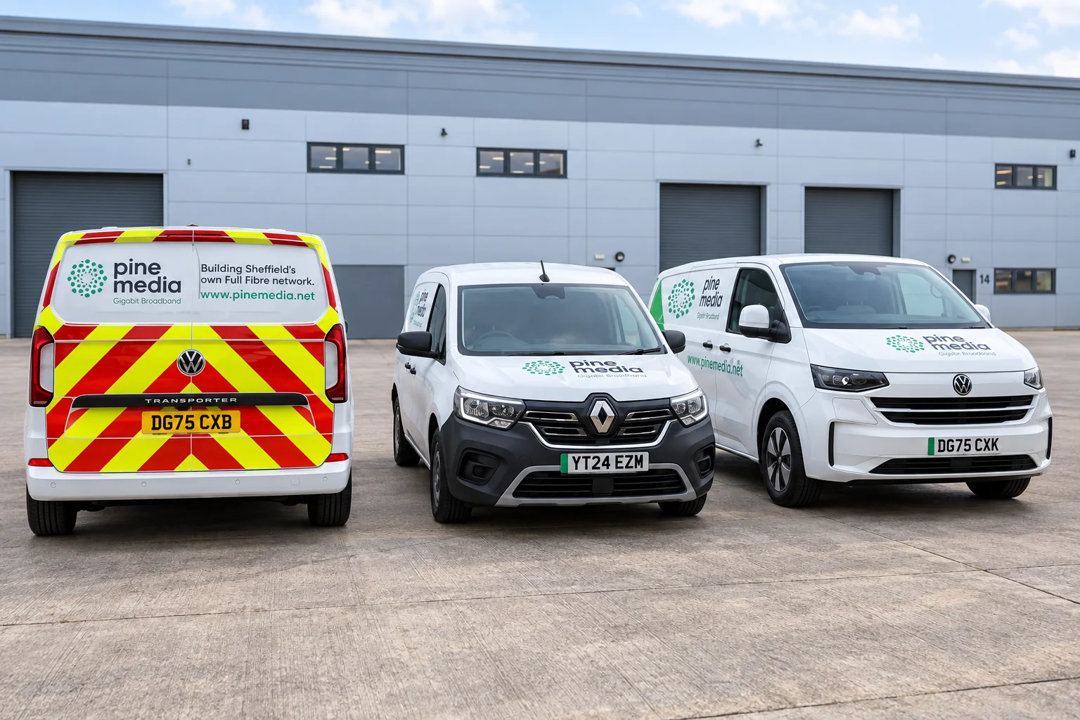 Retouched photograph of three Pine Media electric vans at the Sheffield yard